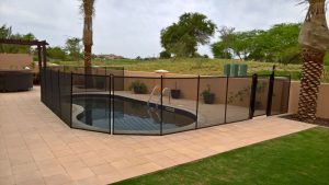 Pool safety fence, at Flame Tree Ridge, Jumeirah Golf Estates, Dubai.